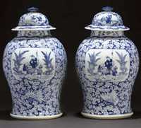 19th Century Pair of blue and white baluster jars and covers